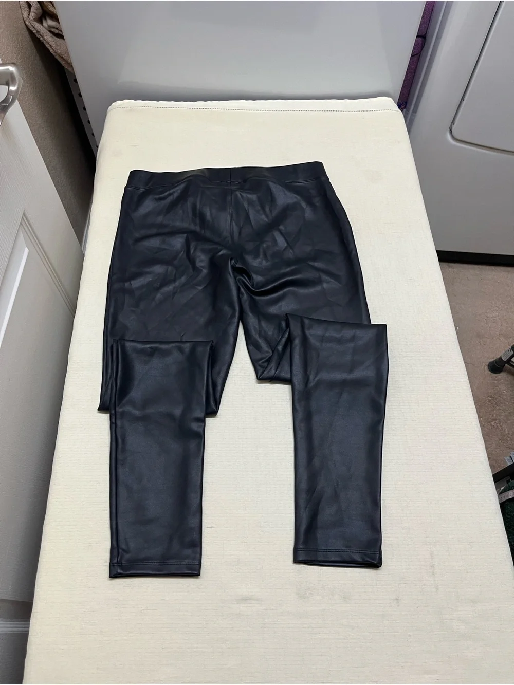 Express M black faux leather leggings